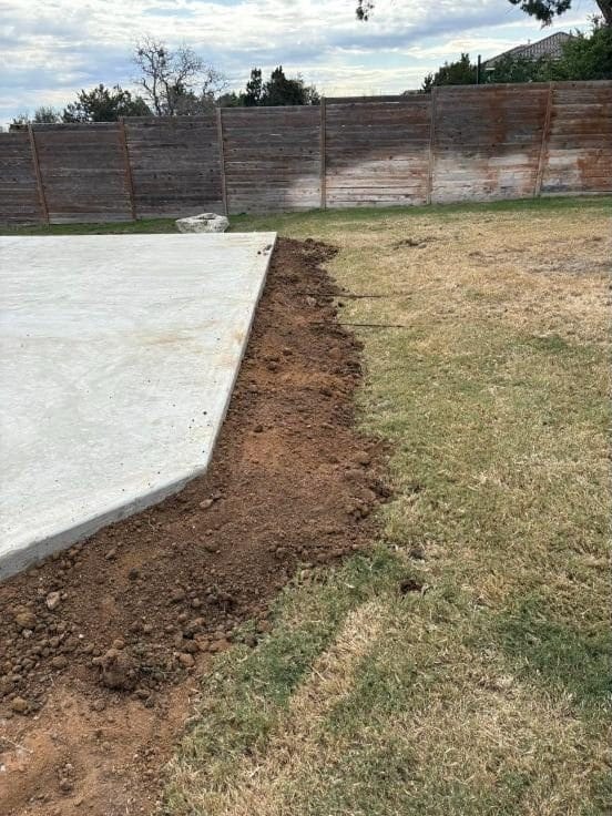 Fresh concrete slab in a back yard